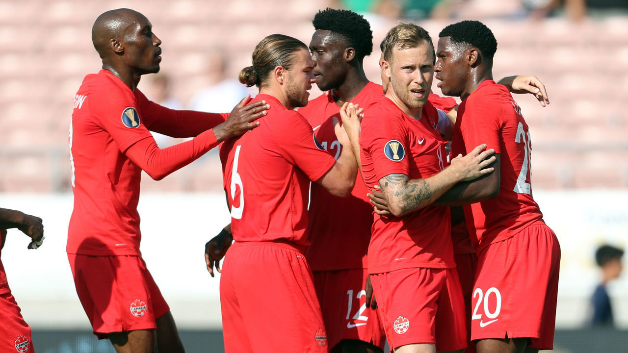 PASADENA, CA - JUNE 15: Jonathan David #20 of Canada celebrateswith teammates after scoring his team's first goal during a CONCACAF Gold Cup Group A match between Canada and Martinique at Rose Bowl on June 15, 2019 in Pasadena, California.