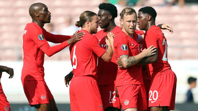 PASADENA, CA - JUNE 15: Jonathan David #20 of Canada celebrateswith teammates after scoring his team's first goal during a CONCACAF Gold Cup Group A match between Canada and Martinique at Rose Bowl on June 15, 2019 in Pasadena, California.