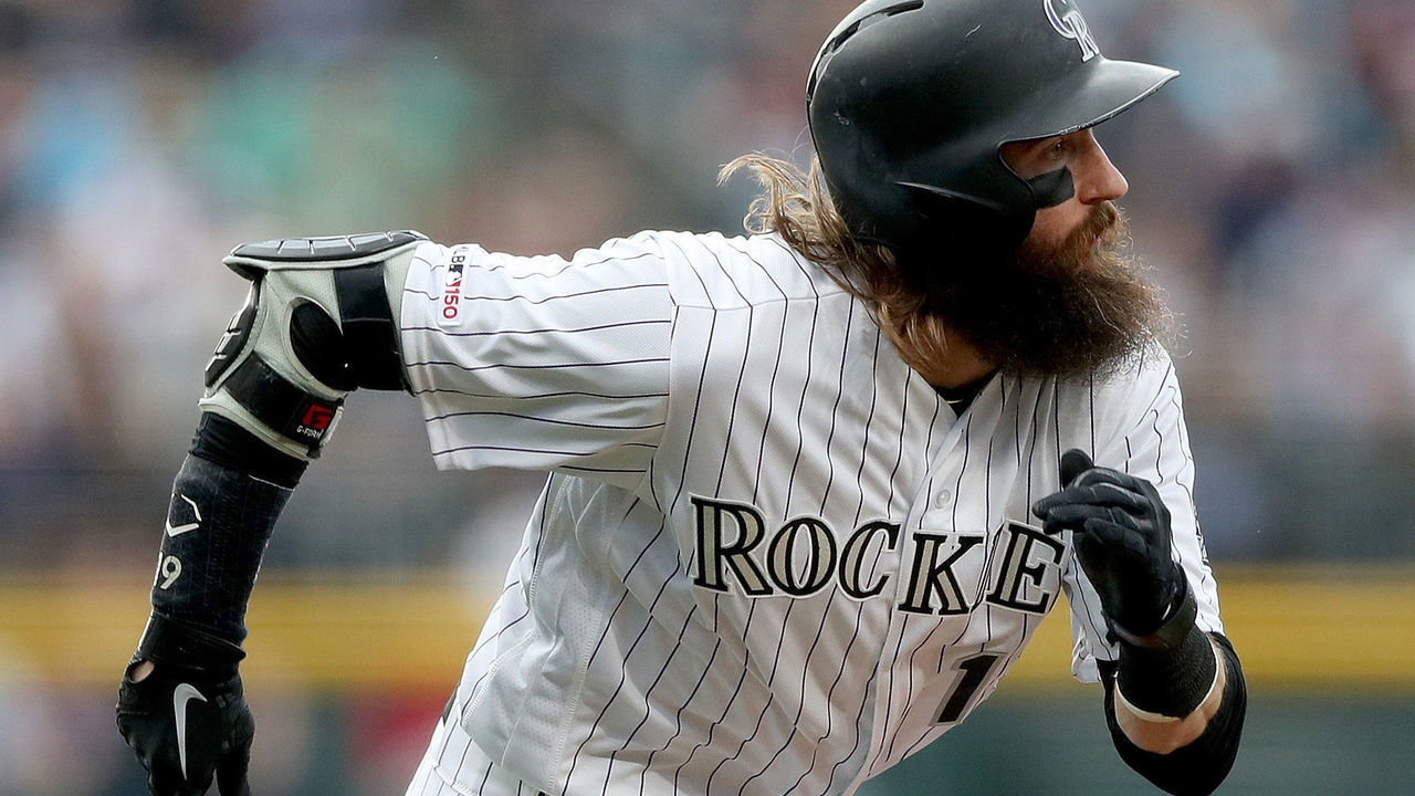 DENVER, COLORADO - JUNE 15: Charlie Blackmon #19 of the Colorado Rockies scores on a David Dahl sacrifice in the first inning against the San Diego Padres at Coors Field on June 15, 2019 in Denver, Colorado.