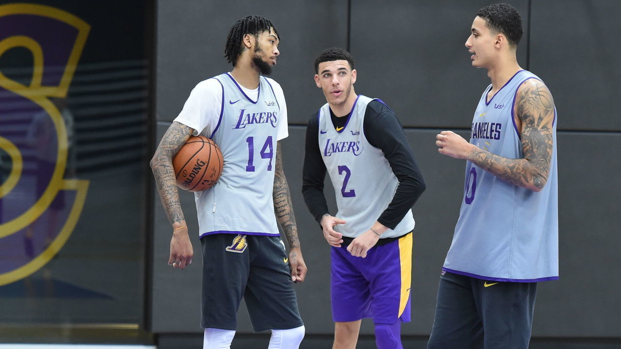 EL SEGUNDO, CA - SEPTEMBER 26: Brandon Ingram #14 Lonzo Ball #2 and Kyle Kuzma #0 of the Los Angeles Lakers look on at practice at UCLA Health Training Center on September 25, 2018 in El Segundo, California. NOTE TO USER: User expressly acknowledges and agrees that, by downloading and/or using this Photograph, user is consenting to the terms and conditions of the Getty Images License Agreement. Mandatory Copyright Notice: Copyright 2018 NBAE