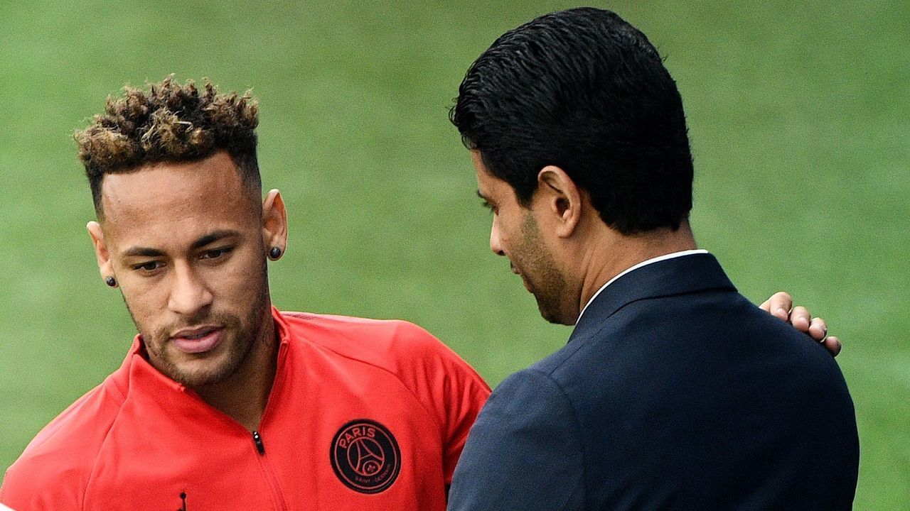 Paris Saint-Germain's Brazilian forward Neymar (L) speaks with Paris Saint-Germain's Qatari president Nasser Al-Khelaifi (R) and Paris Saint-Germain's Portuguese sporting director Antero Henrique before a training session at Saint-Germain-en-Laye, western Paris on September 13, 2018 on the eve of the French L1 football match between Paris Saint-Germain and Saint Etienne.