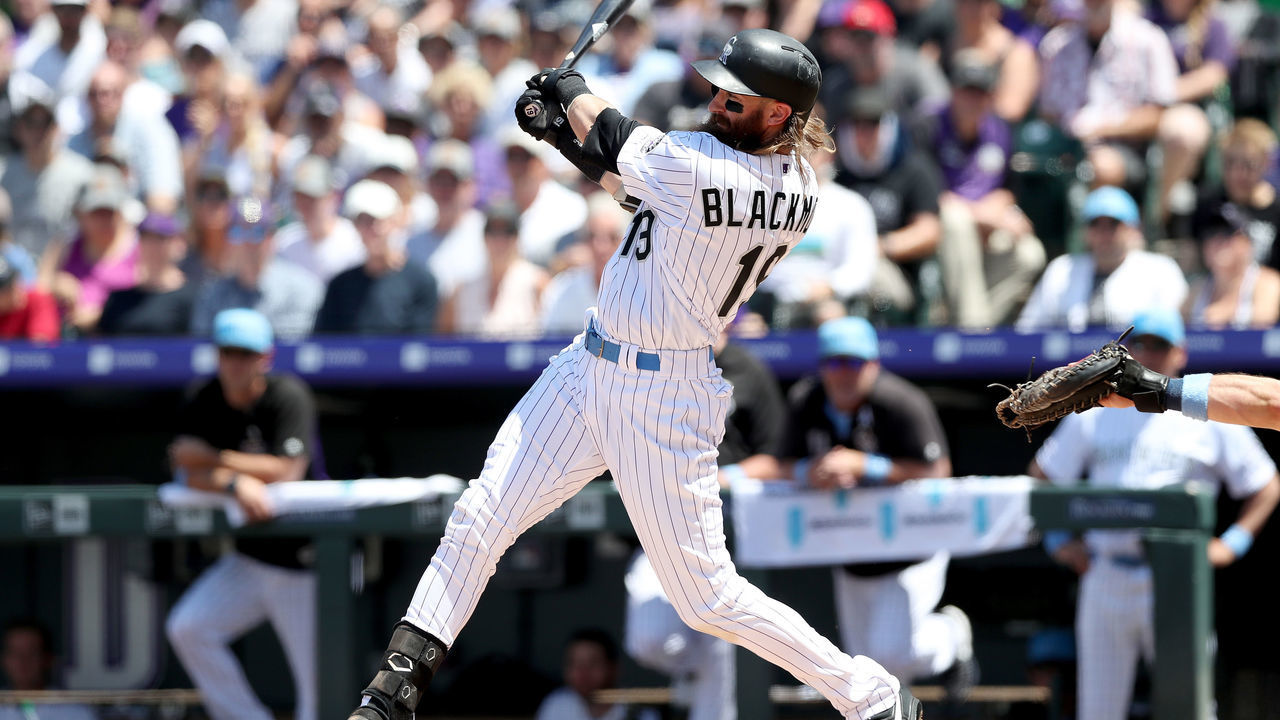 DENVER, COLORADO - JUNE 16: Charlie Blackmon #19 of the Colorado Rockies hits a single in his second at bat in the first inning against the San Diego Padres at Coors Field on June 16, 2019 in Denver, Colorado.