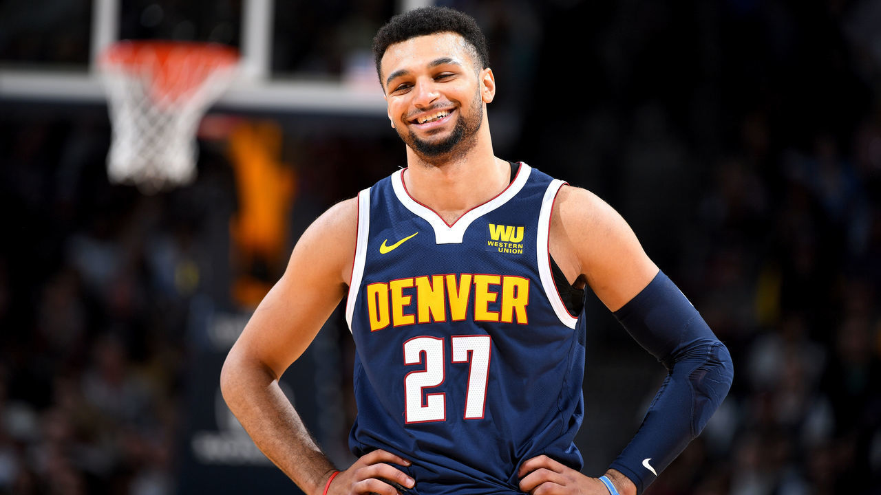 DENVER, CO - JANUARY 05: Jamal Murray #27 of the Denver Nuggets smiles against the Charlotte Hornets on January 05, 2019 at the Pepsi Center in Denver, Colorado. NOTE TO USER: User expressly acknowledges and agrees that, by downloading and/or using this Photograph, user is consenting to the terms and conditions of the Getty Images License Agreement. Mandatory Copyright Notice: Copyright 2019 NBAE