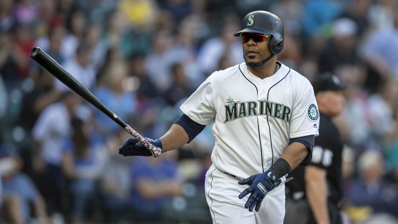 SEATTLE, WA - JUNE 01: Edwin Encarnacion #10 of the Seattle Mariners flips his bat after hitting a home run during a game against the Los Angeles Angels at T-Mobile Park on June 1, 2019 in Seattle, Washington. The Angels won the game 6-3.