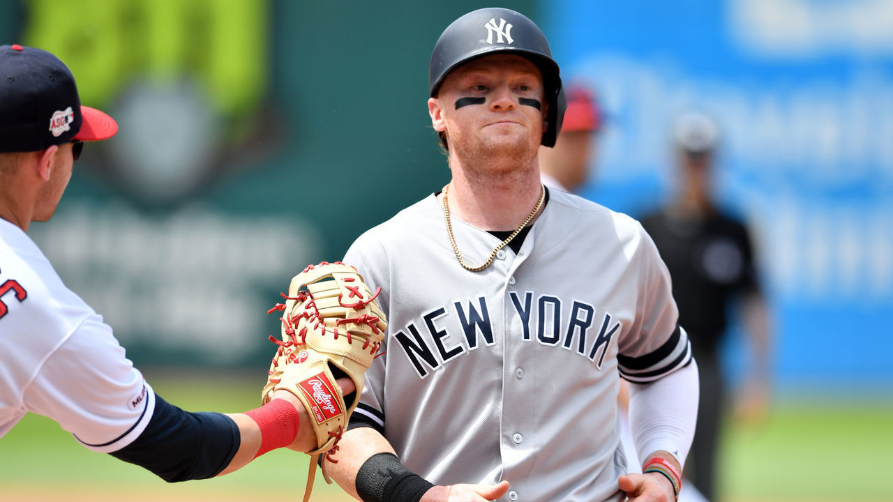 CLEVELAND, OHIO - JUNE 09: First baseman Jake Bauers #10 of the Cleveland Indians catches Clint Frazier #77 of the New York Yankees in a run down during the third inning at Progressive Field on June 09, 2019 in Cleveland, Ohio.