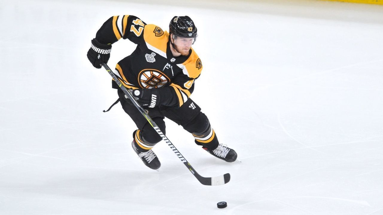 BOSTON, MA - JUNE 12: Boston Bruins defenseman Torey Krug (47) skates hard up ice with the puck. During Game 7 of the Stanley Cup Finals featuring the Boston Bruins against the St. Louis Blues on June 12, 2019 at TD Garden in Boston, MA.