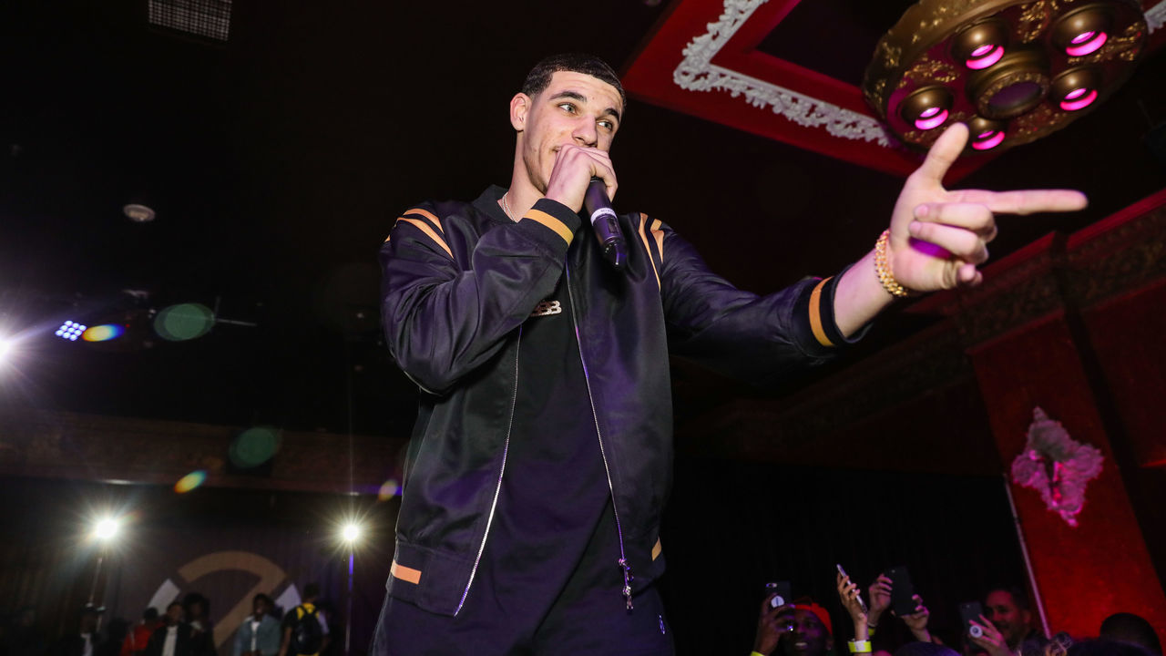 LOS ANGELES, CA - FEBRUARY 16: Lonzo Ball of the Los Angeles Lakers performs as the Big Baller Brand hosts a fashion show and the release of Lonzo Ball's "Born 2 Ball" mixtape at the Belasco Theatre on February 16, 2018 in Los Angeles, California.