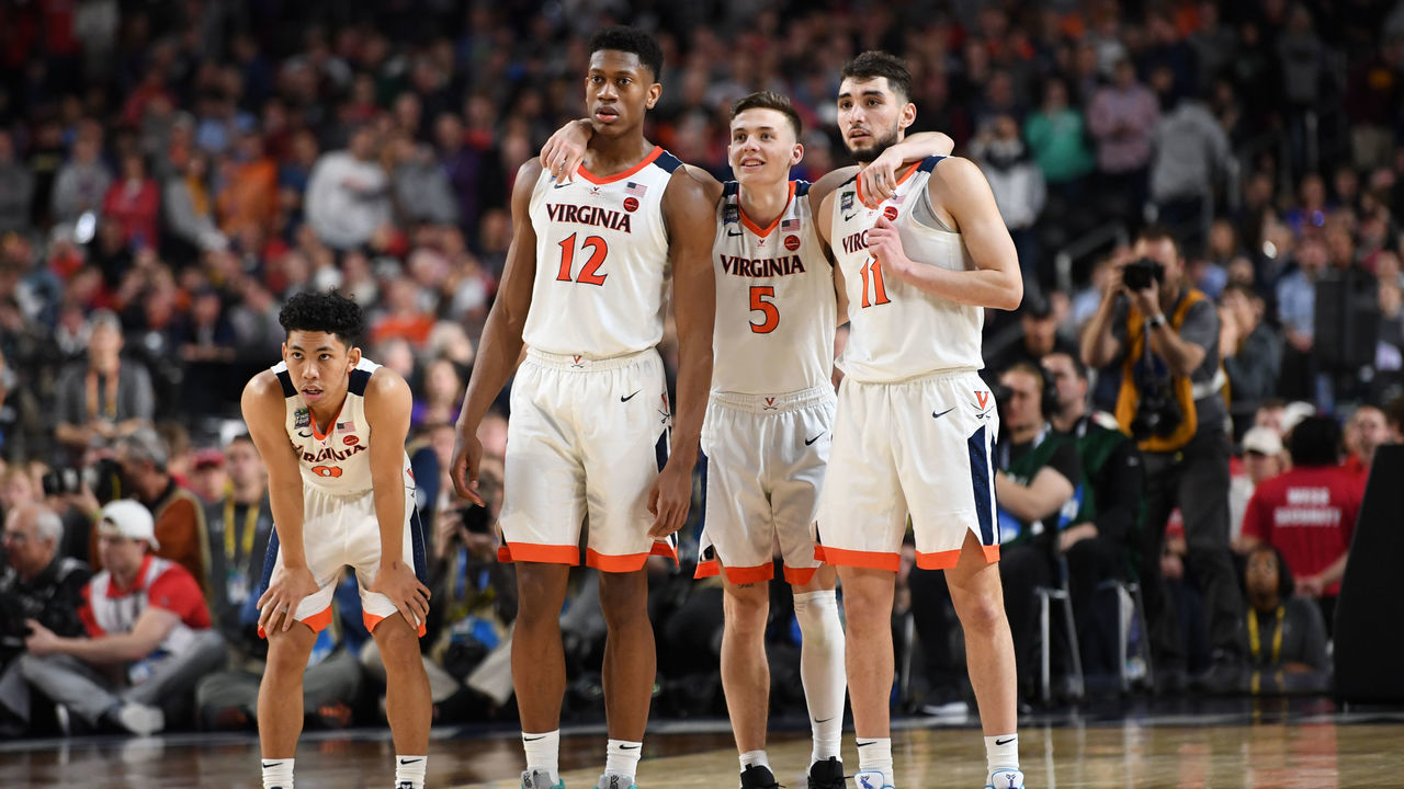 MINNEAPOLIS , MN - APRIL 8: Virginia Cavaliers guard Kihei Clark (0), guard De'Andre Hunter (12), guard Kyle Guy (5), and guard Ty Jerome (11) wait for the final buzzer to sound during The National Championship game at U.S. Bank Stadium. the Virginia Cavaliers defeated the Texas Tech 85-77 in overtime.