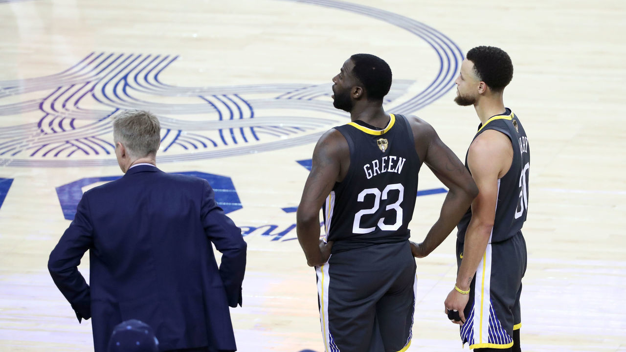 OAKLAND, CA - JUNE 13: Draymond Green #23 and Stephen Curry #30 of the Golden State Warriors look on during Game Six of the NBA Finals on June 13, 2019 at ORACLE Arena in Oakland, California. NOTE TO USER: User expressly acknowledges and agrees that, by downloading and/or using this photograph, user is consenting to the terms and conditions of Getty Images License Agreement. Mandatory Copyright Notice: Copyright 2019 NBAE