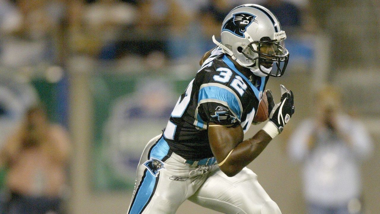 CHARLOTTE, NC - OCTOBER 03: Rod Smart #32 of the Carolina Panthers runs with the ball during a game against the Green Bay Packers on October 3, 2005 at the Bank of America Stadium in Charlotte, North Carolina.