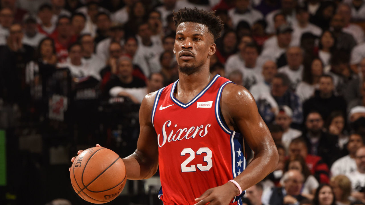TORONTO, CANADA - MAY 12: Jimmy Butler #23 of the Philadelphia 76ers brings the ball up the court against the Toronto Raptors during Game Seven of the Eastern Conference Semi-Finals of the 2019 NBA Playoffs on May 12, 2019 at the Scotiabank Arena in Toronto, Ontario, Canada. Mandatory Copyright Notice: Copyright 2019 NBAE