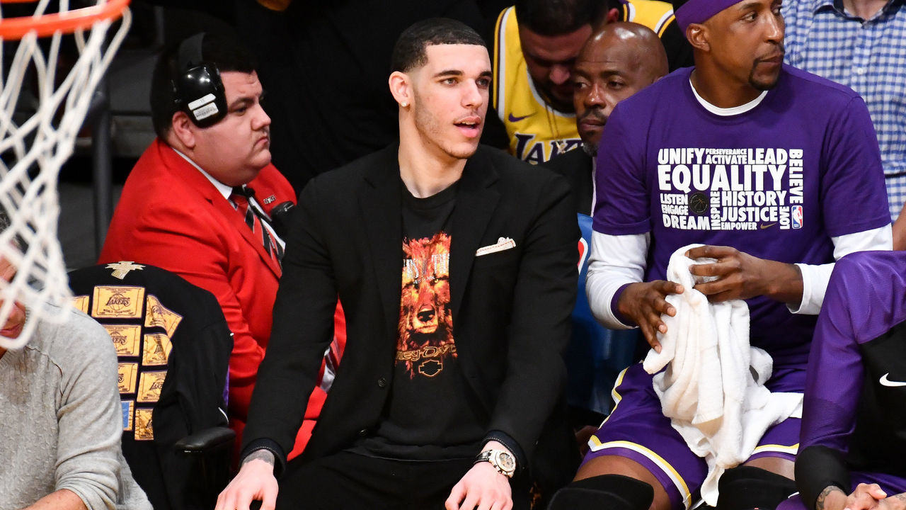 LOS ANGELES, CALIFORNIA - FEBRUARY 27: Lonzo Ball watches from the bench during a basketball game between the Los Angeles Lakers and the New Orleans Pelicans at Staples Center on February 27, 2019 in Los Angeles, California.