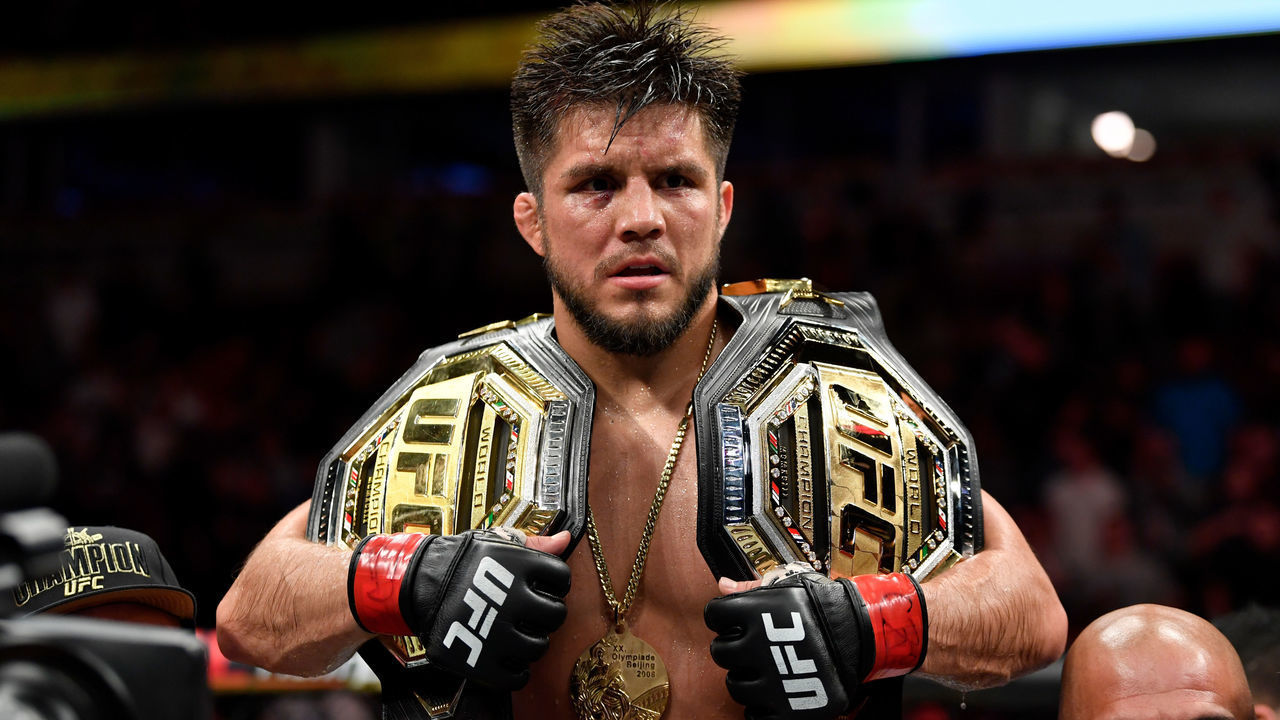 CHICAGO, IL - JUNE 08: Henry Cejudo celebrates his TKO victory over Marlon Moraes of Brazil in their bantamweight championship bout during the UFC 238 event at the United Center on June 8, 2019 in Chicago, Illinois.