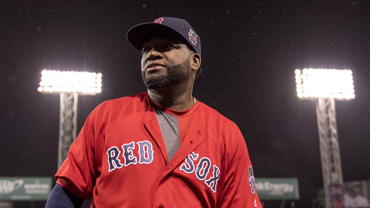 BOSTON, MA - SEPTEMBER 30: David Ortiz #34 of the Boston Red Sox reacts during a retirement tribute ceremony before a game against the Toronto Blue Jays on September 30, 2016 at Fenway Park in Boston, Massachusetts.