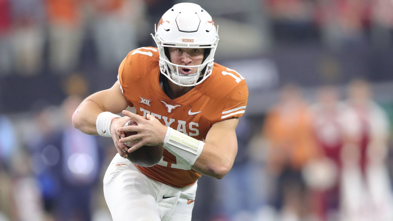 ARLINGTON, TX - DECEMBER 01: Texas (11) Sam Ehlinger (QB) runs the ball in the Big 12 Championship Game between the Oklahoma Sooners and the Texas Longhorns on December 1st at AT&T Stadium in Arlington, TX.
