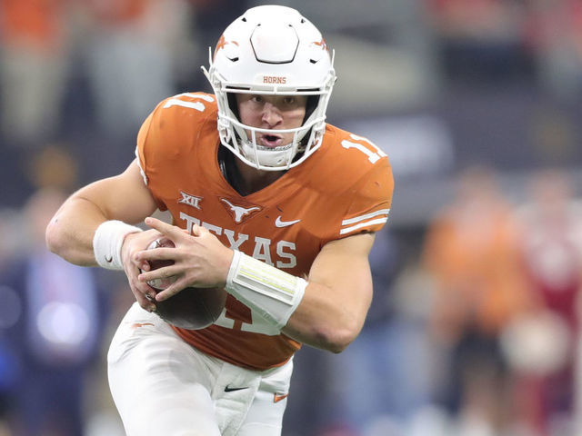 ARLINGTON, TX - DECEMBER 01: Texas (11) Sam Ehlinger (QB) runs the ball in the Big 12 Championship Game between the Oklahoma Sooners and the Texas Longhorns on December 1st at AT&T Stadium in Arlington, TX.