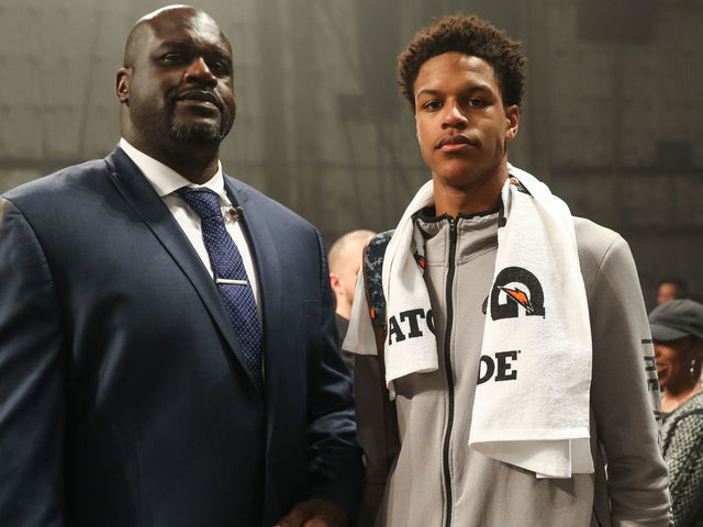 STUDIO CITY, CA - JANUARY 25: Shaquille O'Neal (L) poses with his son Shareef O'Neal (R) at the Jordan Brand Future of Flight Showcase on January 25, 2018 in Studio City, California.