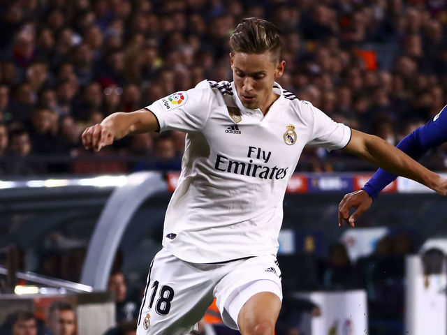 MARCOS LLORENTE (L) and FC Barcelona's forward Malcom during semifinal of spanish King Cup frist leg match between FC Barcelona and Real Madrid at Nou Camp Stadium on February 6, 2019.