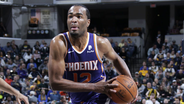 INDIANAPOLIS, IN - JANUARY 15: T.J. Warren #12 of the Phoenix Suns handles the ball against the Indiana Pacers on January 15, 2019 at Bankers Life Fieldhouse in Indianapolis, Indiana. Mandatory Copyright Notice: Copyright 2019 NBAE