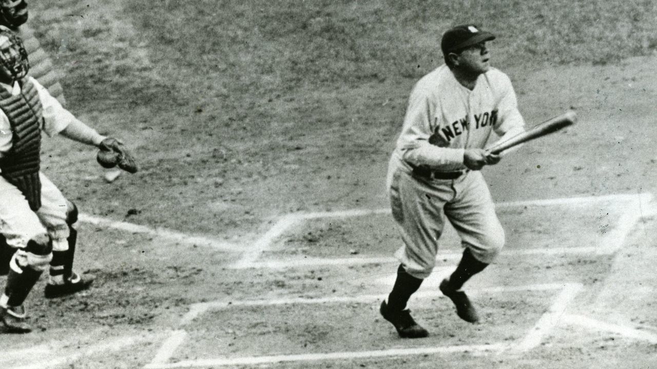 ST. LOUIS, MISSOURI - JUNE, 1932. Babe Ruth watches the flight of the ball he just hit down the right field line for a home run in Sportsmans Park during a game against the St. Louis Browns in June of 1932.