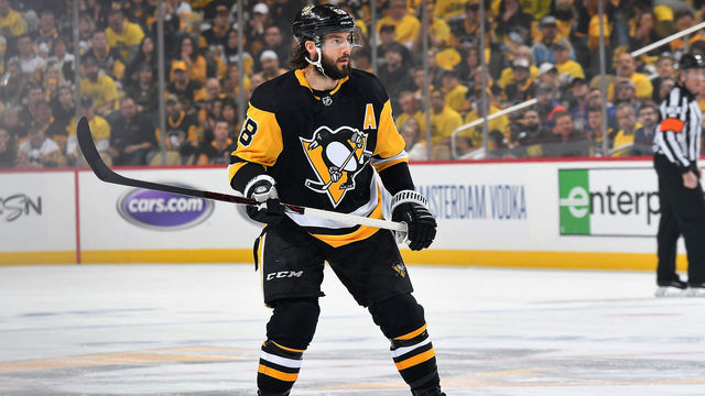 PITTSBURGH, PA - APRIL 16: Kris Letang #58 of the Pittsburgh Penguins skates against the New York Islanders in Game Four of the Eastern Conference First Round during the 2019 NHL Stanley Cup Playoffs at PPG Paints Arena on April 16, 2019 in Pittsburgh, Pennsylvania.