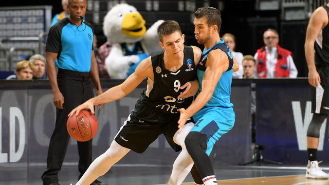 BERLIN, GERMANY - OCTOBER 11: Vanja Marinkovic of BC Partizan Belgrad and Spencer Butterfield of Alba Berlin during the game between Alba Berlin and BC Partizan Belgrad on October 11, 2017 in Berlin, Germany.