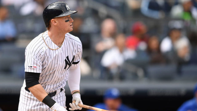 NEW YORK, NEW YORK - APRIL 21: Clint Frazier #77 of the New York Yankees watches his ball fly out of the park, hitting a home run during the fifth inning of the game against the Kansas City Royals at Yankee Stadium on April 21, 2019 in the Bronx borough of New York City.