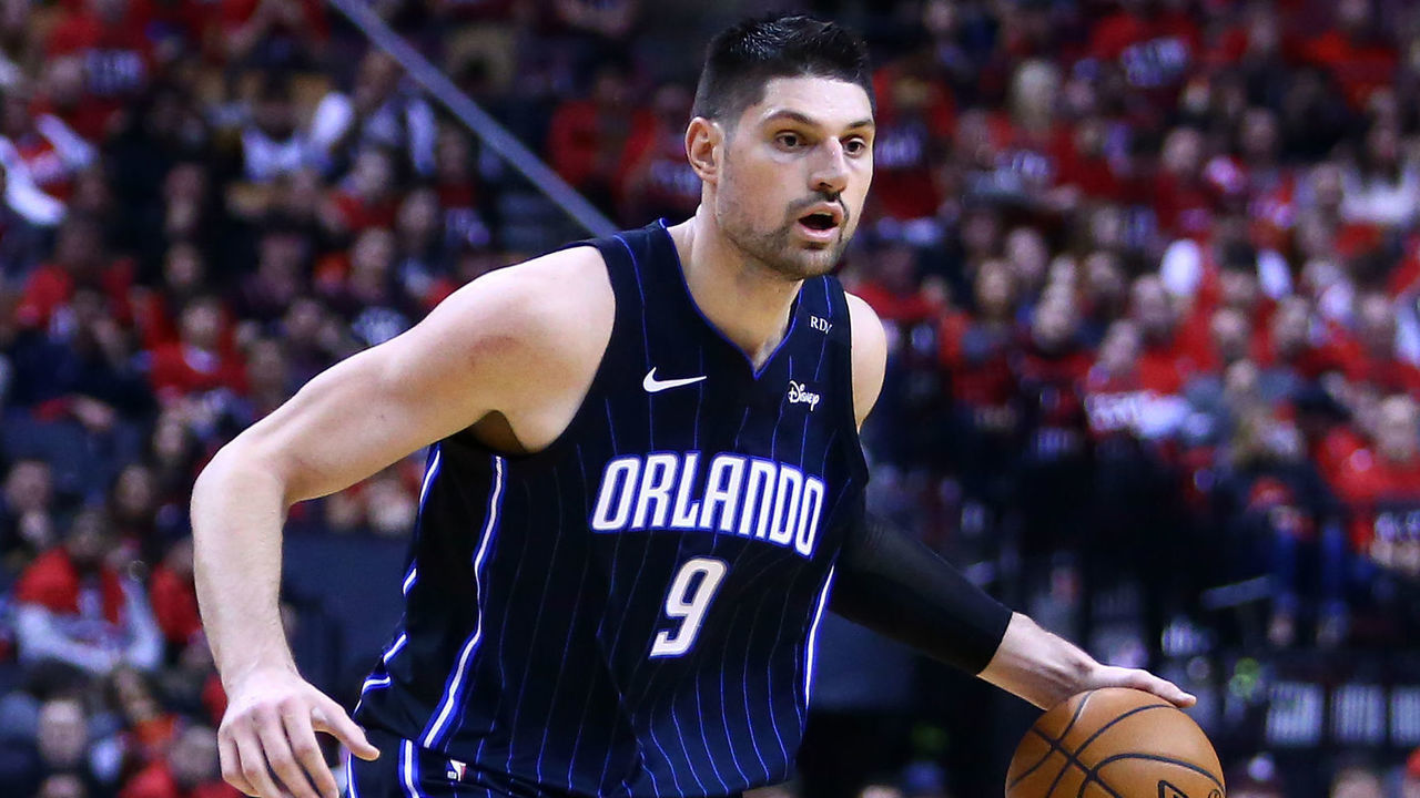 TORONTO, ON - APRIL 13: Nikola Vucevic #9 of the Orlando Magic dribbles the ball during Game One of the first round of the 2019 NBA playoffs against the Toronto Raptors at Scotiabank Arena on April 13, 2019 in Toronto, Canada.