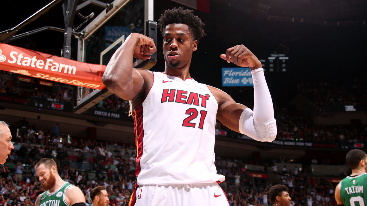 MIAMI, FL - APRIL 3: Hassan Whiteside #21 of the Miami Heat reacts to a play during the game against the Boston Celtics on April 3, 2019 at American Airlines Arena in Miami, Florida. NOTE TO USER: User expressly acknowledges and agrees that, by downloading and/or using this photograph, user is consenting to the terms and conditions of the Getty Images License Agreement. Mandatory Copyright Notice: Copyright 2019 NBAE