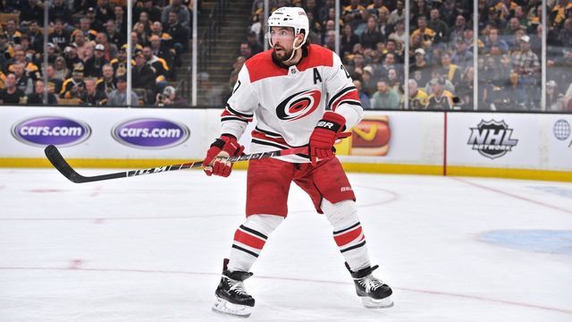 BOSTON, MA - MAY 09: Carolina Hurricanes defenseman Justin Faulk (27) looks up ice to see which teammate got his pass. During Game 1 of the Eastern Conference Finals featuring the Carolina Hurricanes against the Boston Bruins on May 09, 2019 at TD Garden in Boston, MA.