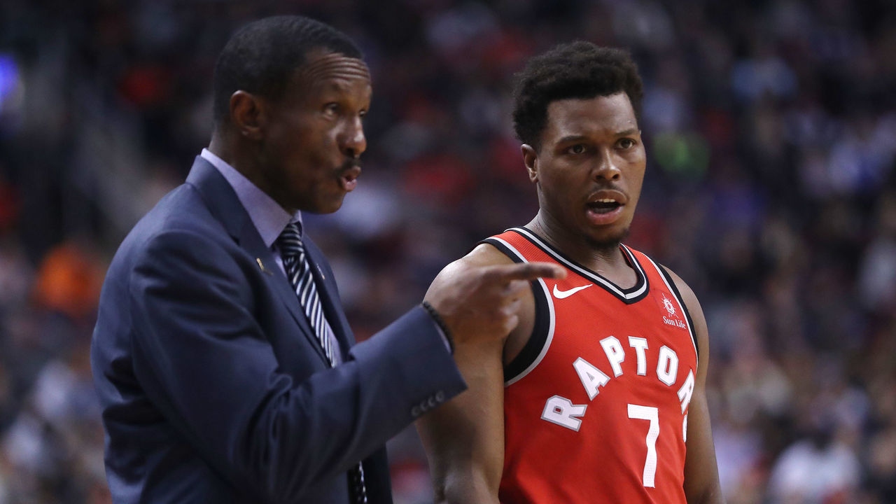 TORONTO, ON- NOVEMBER 19 - Toronto Raptors head coach Dwane Casey talks things over with Toronto Raptors guard Kyle Lowry (7) as the Toronto Raptors play the Washington Wizards at the Air Canada Centre in Toronto. November 19, 2017. (Steve Russell/Toronto Star via Getty Images)