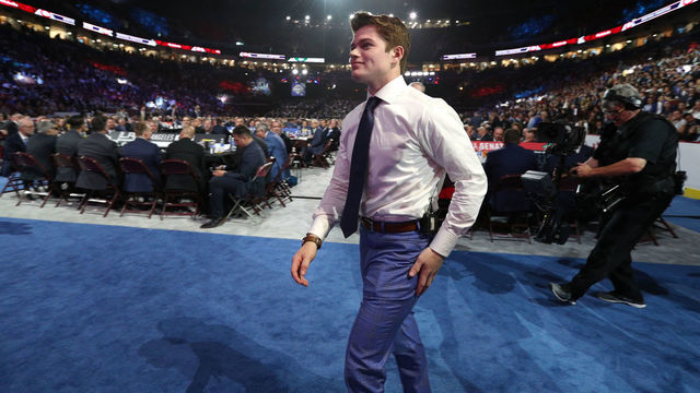 VANCOUVER, BRITISH COLUMBIA - JUNE 21: Cole Caufield, fifteenth overall pick of the Montreal Canadiens, walks the draft floor toward the stage during the first round of the 2019 NHL Draft at Rogers Arena on June 21, 2019 in Vancouver, Canada.