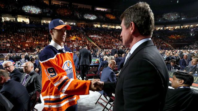VANCOUVER, BRITISH COLUMBIA - JUNE 21: Philip Broberg, eighth overall pick of the Edmonton Oilers, shakes the hand of Wayne Gretzky on the draft floor during the first round of the 2019 NHL Draft at Rogers Arena on June 21, 2019 in Vancouver, Canada.