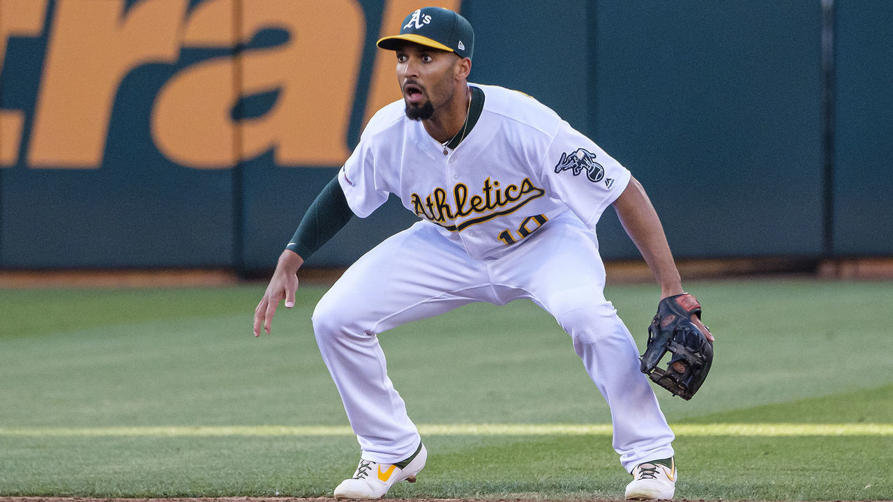 OAKLAND, CA - JUNE 18: Oakland Athletics shortstop Marcus Semien (10) springs into action for an infield play during the game between the Baltimore Orioles and the Oakland Athletics on Tuesday, June 18, 2019 at O.co Coliseum in Oakland, California.