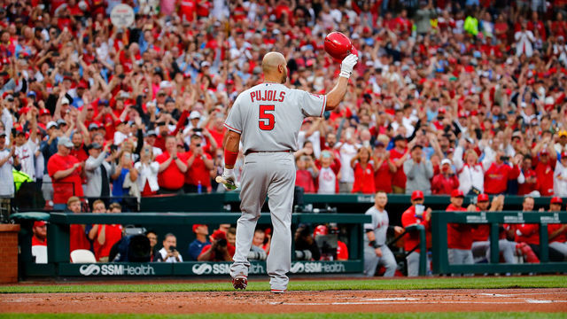 ST LOUIS, MO - JUNE 21: Former St. Louis Cardinal Albert Pujols #5 of the Los Angeles Angels of Anaheim acknowledges a standing ovation from the fans in his first return to Busch Stadium prior to batting against the St. Louis Cardinals on June 21, 2019 in St Louis, Missouri.