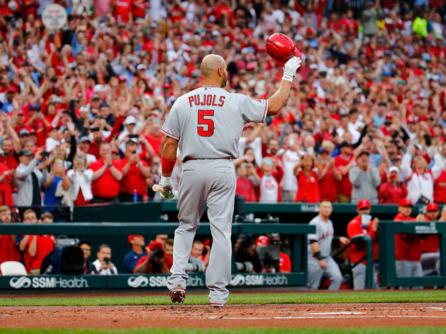 ST LOUIS, MO - JUNE 21: Former St. Louis Cardinal Albert Pujols #5 of the Los Angeles Angels of Anaheim acknowledges a standing ovation from the fans in his first return to Busch Stadium prior to batting against the St. Louis Cardinals on June 21, 2019 in St Louis, Missouri.