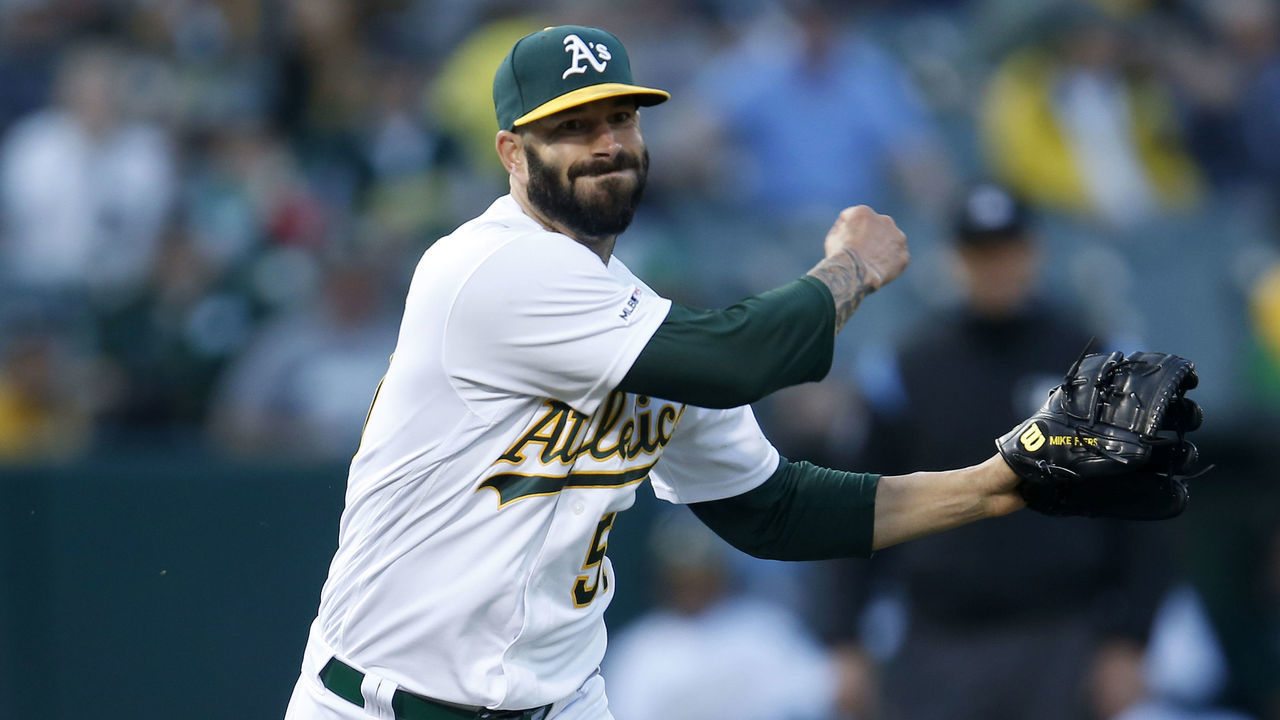 OAKLAND, CA - JUNE 17: Oakland Athletics starting pitcher Mike Fiers #50 makes an out at first on a hit by Baltimore Orioles' Trey Mancini #16 during the third inning of their MLB game at the Coliseum in Oakland, Calif., on Monday, June 17, 2019.