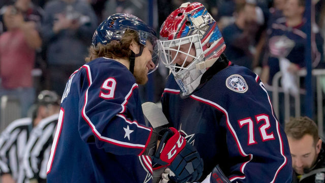 COLUMBUS, OH - APRIL 14: Columbus Blue Jackets left wing Artemi Panarin (9) and Columbus Blue Jackets goaltender Sergei Bobrovsky (72) celebrate after winning game three of a Stanley Cup first round playoff game between the Columbus Blue Jackets and the Tampa Bay Lightning on April 14, 2019 at Nationwide Arena in Columbus, OH.