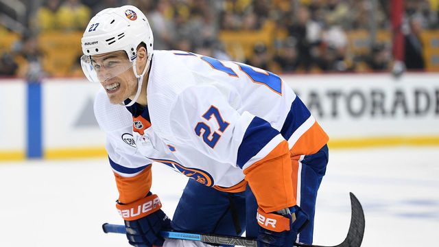 PITTSBURGH, PA - APRIL 14: Anders Lee #27 of the New York Islanders prepares to take a faceoff during the first period in Game Three of the Eastern Conference First Round against the Pittsburgh Penguins during the 2019 NHL Stanley Cup Playoffs at PPG PAINTS Arena on April 14, 2019 in Pittsburgh, Pennsylvania.