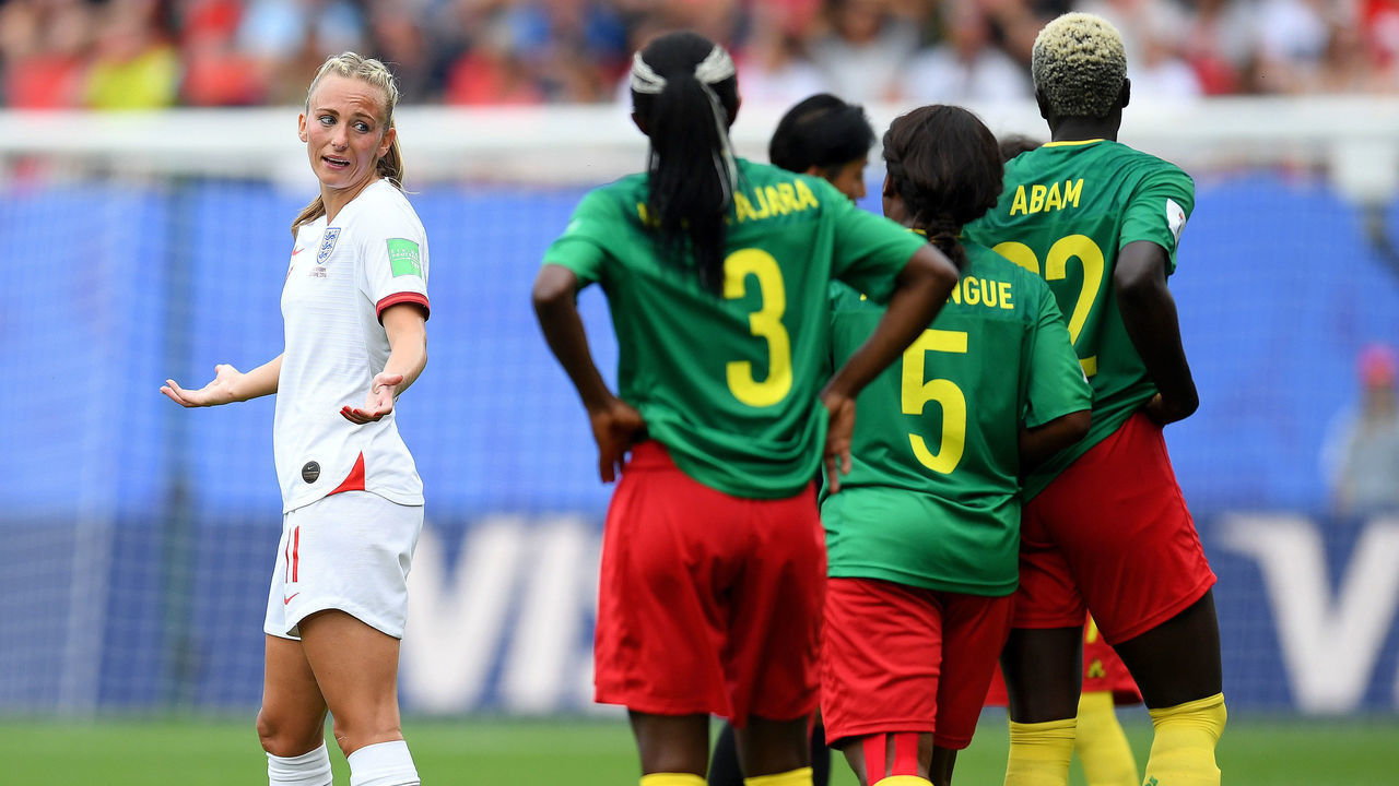 VALENCIENNES, FRANCE - JUNE 23: Toni Duggan of England talks to players of Cameroon during the 2019 FIFA Women's World Cup France Round Of 16 match between England and Cameroon at Stade du Hainaut on June 23, 2019 in Valenciennes, France.