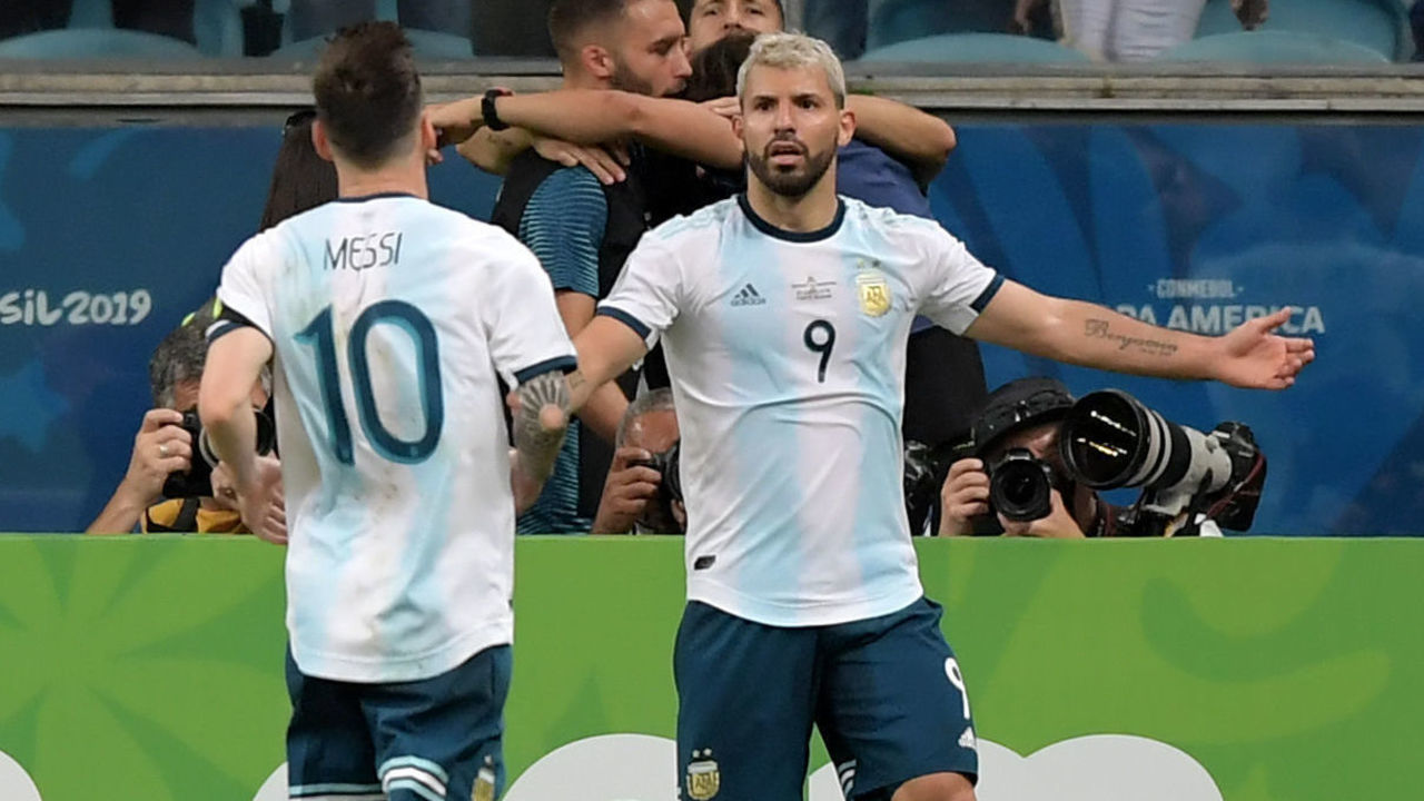 Argentina's Sergio Aguero (R) celebrates with Argentina's Lionel Messi after scoring against Qatar during their Copa America football tournament group match at the Gremio Arena in Porto Alegre, Brazil, on June 23, 2019.