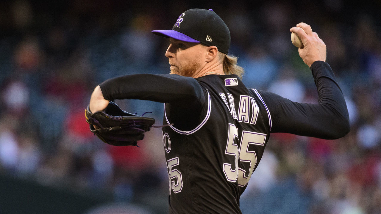 PHOENIX, ARIZONA - JUNE 19: Jon Gray #55 of the Colorado Rockies delivers a pitch in the first inning of the MLB game against the Arizona Diamondbacks at Chase Field on June 19, 2019 in Phoenix, Arizona.