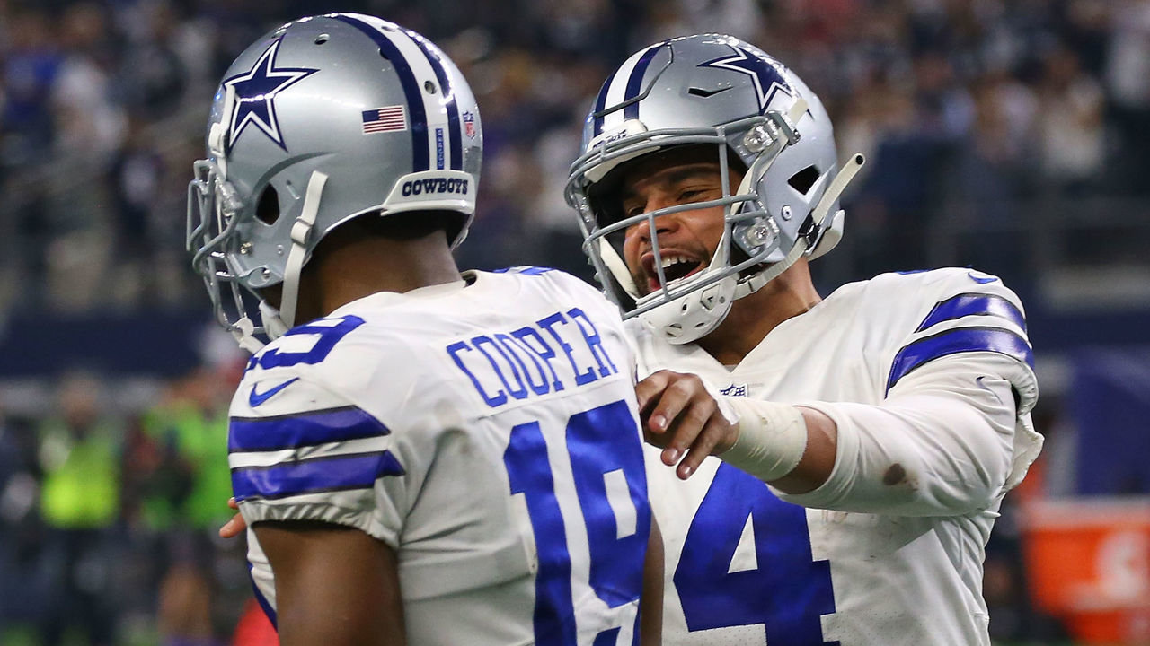 ARLINGTON, TEXAS - DECEMBER 09: Amari Cooper #19 of the Dallas Cowboys celebrates his second touchdown with Dak Prescott #4 against the Philadelphia Eagles at AT&T Stadium on December 09, 2018 in Arlington, Texas.