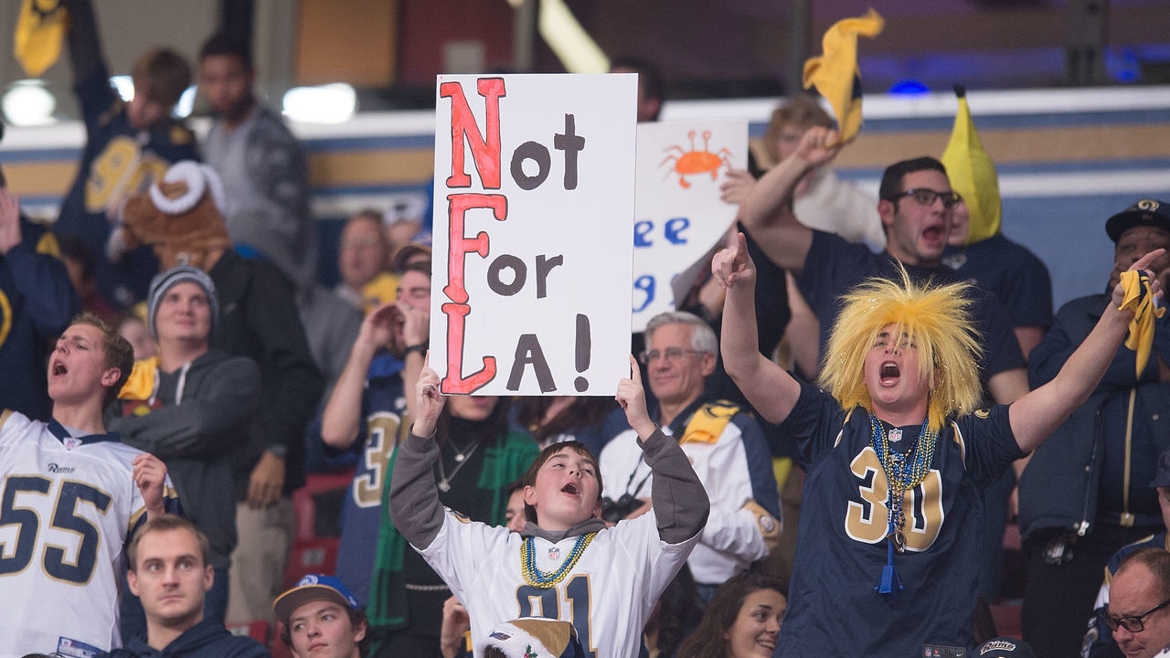 ST. LOUIS, MO - DECEMBER 17: A fan displays a sign in support of keeping the St. Louis Rams in St. Louis during the final home game of the season against the Tampa Bay Buccaneers at the Edward Jones Dome on December 17, 2015 in St. Louis, Missouri.