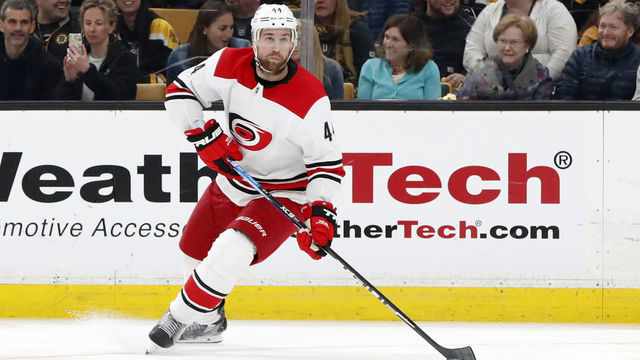 BOSTON, MA - MAY 12: Carolina Hurricanes defenseman Calvin de Haan (44) looks cross ice during Game 2 of the Stanley Cup Playoffs Eastern Conference Finals between the Boston Bruins and the Carolina Hurricanes on May 12, 2019, at TD Garden in Boston, Massachusetts.
