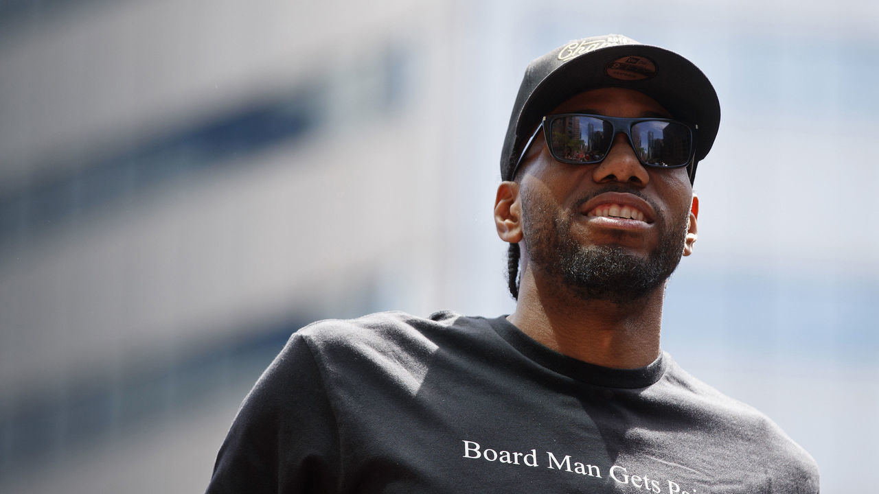 TORONTO, ON - JUNE 17: Kawhi Leonard #2 of the Toronto Raptors looks on from the team bus during the Toronto Raptors Championship Victory Parade on June 17, 2019 in Toronto, Ontario. NOTE TO USER: User expressly acknowledges and agrees that, by downloading and/or using this photograph, user is consenting to the terms and conditions of Getty Images License Agreement. Mandatory Copyright Notice: Copyright 2019 NBAE