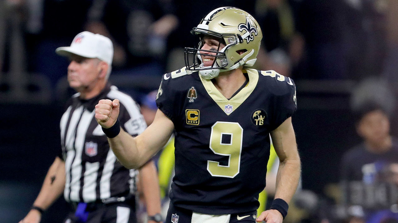 NEW ORLEANS, LOUISIANA - JANUARY 20: Drew Brees #9 of the New Orleans Saints celebrates after Garrett Griffin #45 scored a touchdown against the Los Angeles Rams during the first quarter in the NFC Championship game at the Mercedes-Benz Superdome on January 20, 2019 in New Orleans, Louisiana.