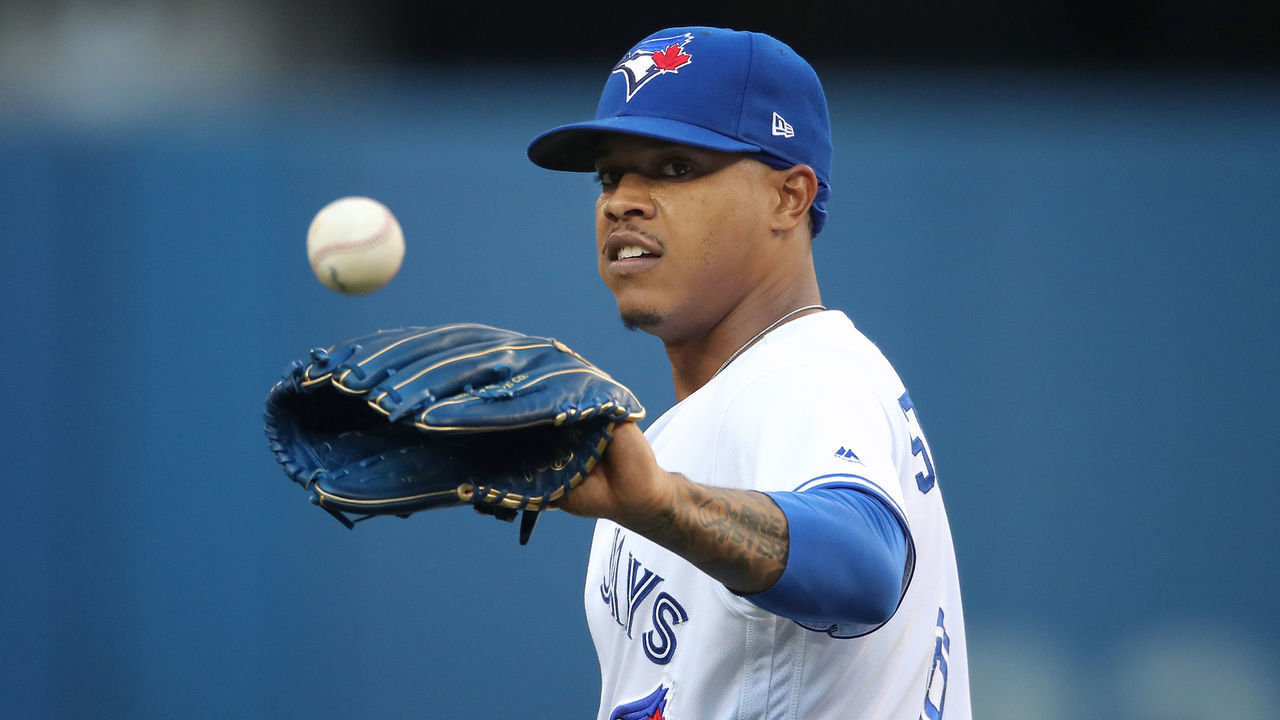 TORONTO, ON - JUNE 07: Marcus Stroman #6 of the Toronto Blue Jays gets the baseball as he gets ready to pitch in the first inning during MLB game action against the Arizona Diamondbacks at Rogers Centre on June 7, 2019 in Toronto, Canada.