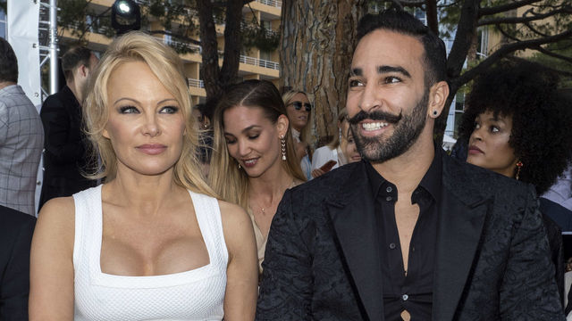 MONTE-CARLO, MONACO - MAY 24: (L-R) Pamela Anderson and Adil Rami attend Amber Lounge 2019 Fashion Show on May 24, 2019 in Monte-Carlo, Monaco.