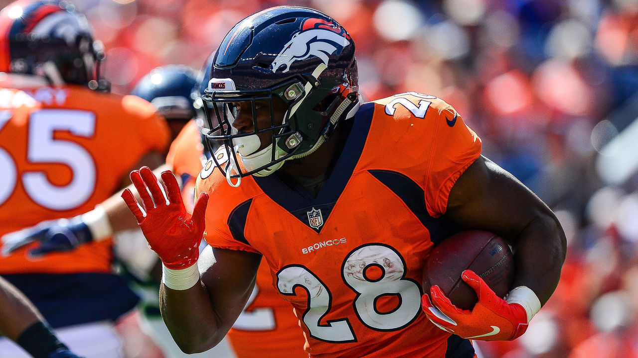 DENVER, CO - SEPTEMBER 9: Running back Royce Freeman #28 of the Denver Broncos carries the ball against the Seattle Seahawks at Broncos Stadium at Mile High on September 9, 2018 in Denver, Colorado.